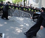 priests removing police cordon 2013-05-17