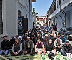 Muslims praying in the street outside the mosque in Batumi