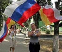 russian_and_south_ossetian_flags_woman