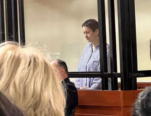 Award-winning editor fined for placing protest sticker on police building